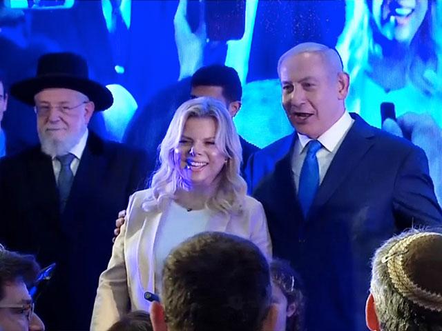 Israeli Prime Minister Benjamin Netanyahu and his wife, Sara, at Likud Party's Hanukkah Celebration, Photo, Screen Capture, GPO