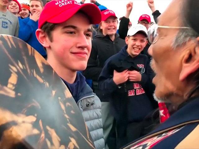 Catholic student Nick Sandmann being confronted by Native American elder (Photo credit: screen capture from video))