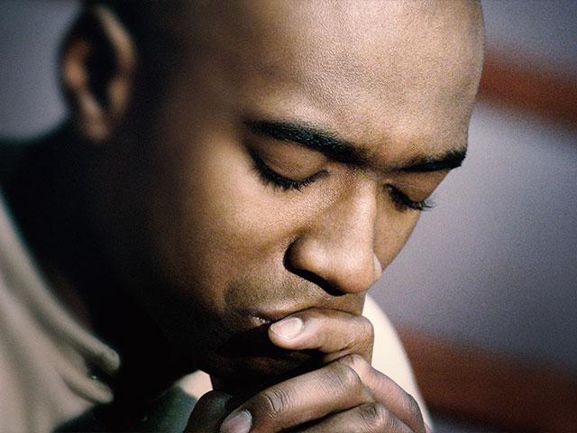 African Man Praying