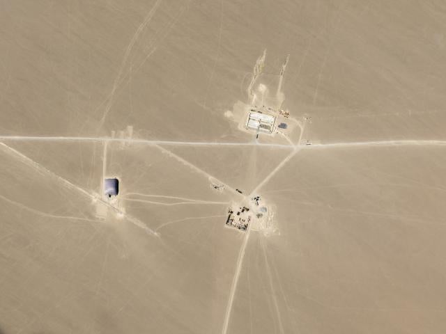 This July 25, 2021, satellite image provided by Planet Labs Inc. shows what analysts believe is construction on an intercontinental ballistic missile silo near Hami, China. (Planet Labs Inc. via AP)