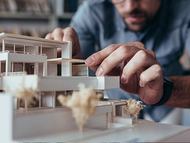 architect building a model house