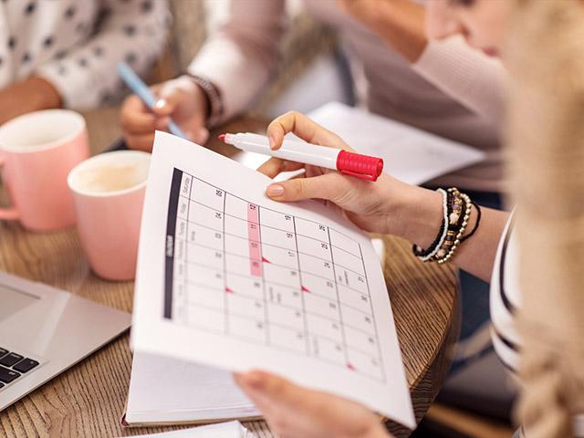 women with planning calendars