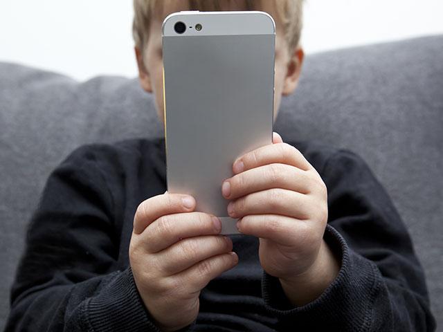 Kid using a CellPhone