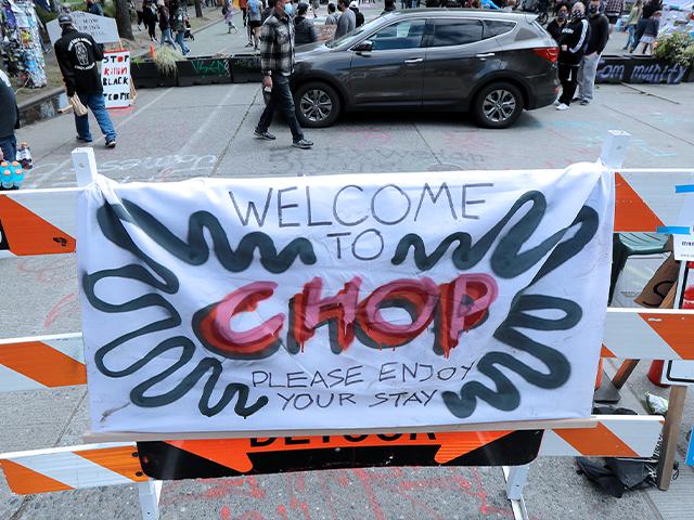 The Capitol Hill Occupied Protest (CHOP) zone in Seattle. Protesters calling for police reform have taken over several blocks near downtown Seattle. CHOP is a change from CHAZ (Capitol Hill Autonomous Zone) that was used earlier (AP Photo/Ted S. Warren)