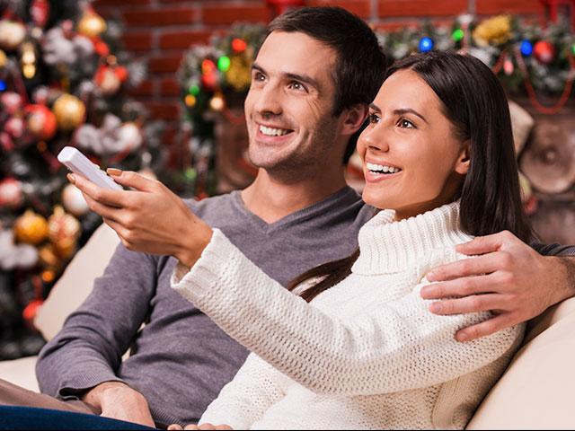 Couple watching a Christmas movie