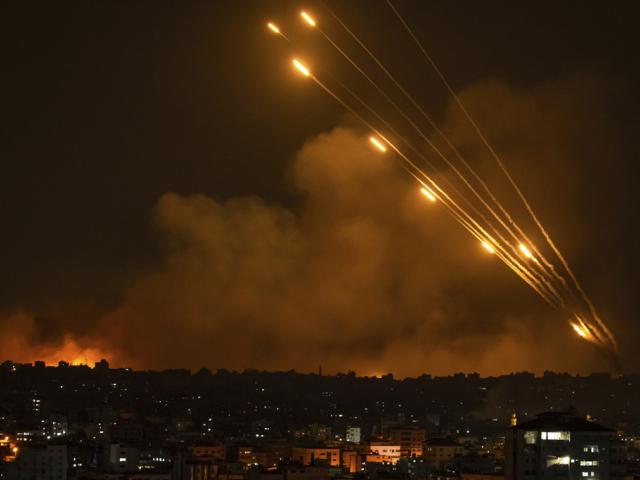 Terrorists fire rockets into Israel from the Gaza Strip, Oct. 8, 2023. (AP Photo/Fatima Shbair)