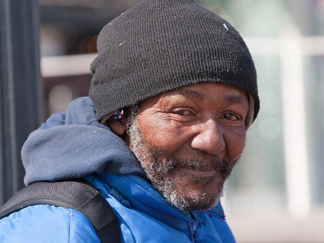 happy homeless man