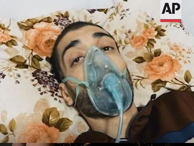 Photo Credit: Screenshot of footage showing Israeli captive Hisham al-Sayed, who was captured by Hamas in 2015, in bed with oxygen mask and IV drip. Footage source: Hamas.