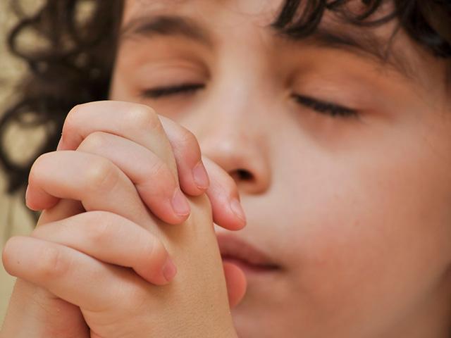 hispanic-boy-praying_SI.jpg