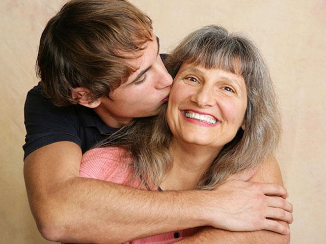 animated image of mother and adult son laughing