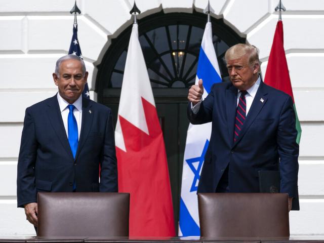 Israeli Prime Minister Benjamin Netanyahu, left, and President Donald Trump stand to depart the Abraham Accords signing ceremony on the South Lawn of the White House, Tuesday, Sept. 15, 2020, in Washington. (AP Photo/Alex Brandon)