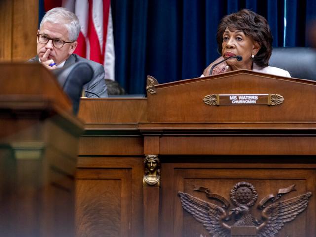 Chairwoman Maxine Waters, D-Calif., right, and Ranking Member Patrick McHenry, R-N.C., left, listen to testimony from banking leaders as they appear before a House Committee. (AP Photo/Andrew Harnik, File)