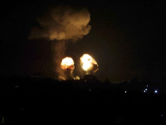 An explosion caused by Israeli airstrikes is seen on Khan Younis, southern Gaza Strip, Sunday, Dec. 4, 2022. (AP Photo/Abed Rahim Khatib)