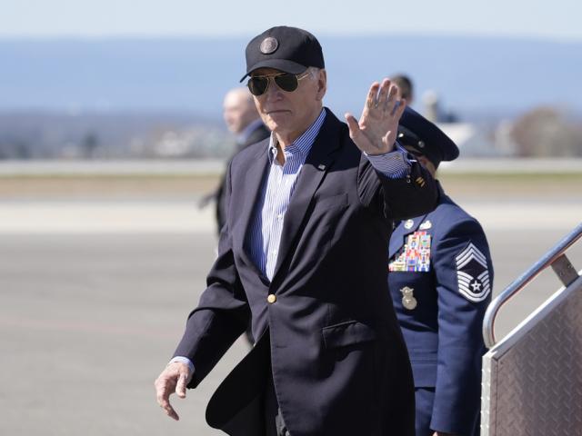 President Joe Biden waves as he arrives Air Force One, Tuesday, March 29, 2024, in Hagerstown, Md. Biden is en route to Camp David.(AP Photo/Alex Brandon)