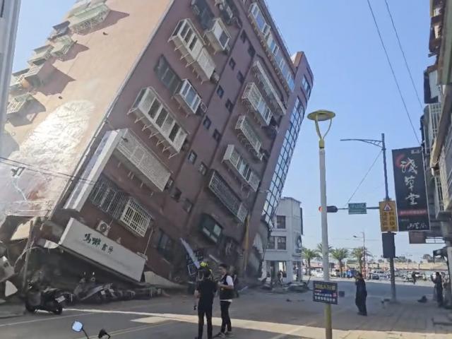 In this image taken from a video footage run by TVBS, a partially collapsed building is seen in Hualien, eastern Taiwan on Wednesday, April 3, 2024. A powerful earthquake rocked the entire island of Taiwan early Wednesday. (TVBS via AP)
