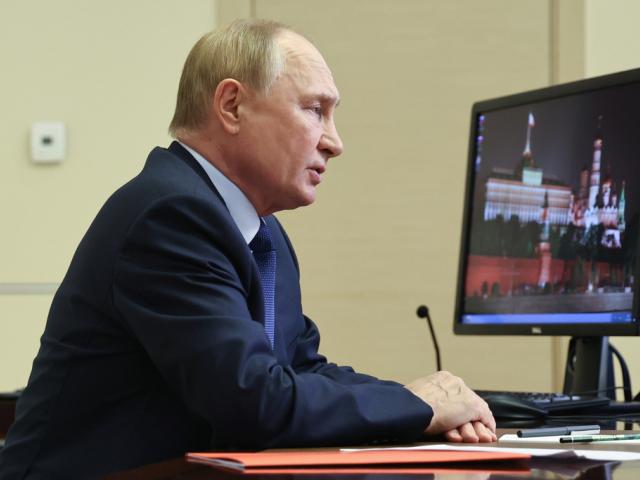 Russian President Vladimir Putin chairs a meeting with members of the Security Council via videoconference at the Novo-Ogaryovo state residence, outside Moscow, Russia, Friday, Sept. 13, 2024. (Alexander Kazakov, Sputnik, Kremlin Pool Photo via AP)