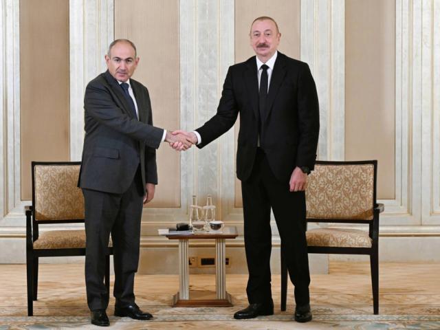 Azerbaijani President Ilham Aliyev, right, and Prime Minister of Armenia Nikol Pashinyan pose for a photo prior to their talks in Abu Dhabi, United Arab Emirates. (Azerbaijani Presidential Press Office via AP) Azerbaijani President Ilham Aliyev, right, and Prime Minister of Armenia Nikol Pashinyan pose for a photo prior to their talks in Abu Dhabi, United Arab Emirates, July 10, 2a025 (Azerbaijani Presidential Press Office via AP)