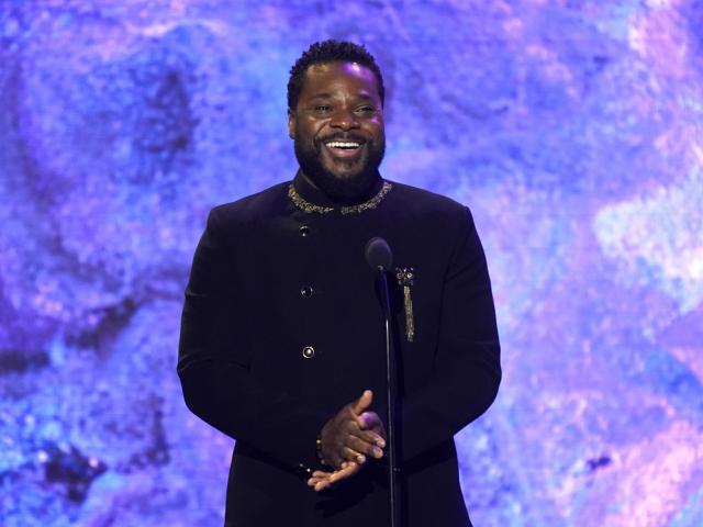 Malcolm-Jamal Warner speaks on stage at the 65th annual Grammy Awards on Sunday, Feb. 5, 2023, in Los Angeles. (AP Photo/Chris Pizzello, File)