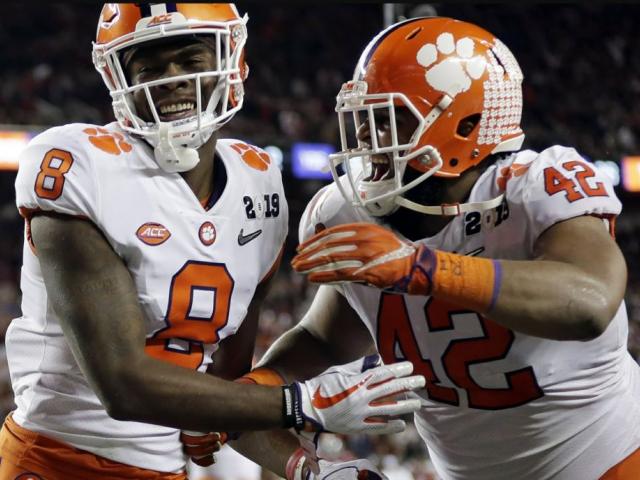 Clemson&#039;s Justyn Ross celebrates his touchdown catch with Christian Wilkins (42) during the second half of the NCAA college football playoff championship game against Alabama Monday night. AP Photo.