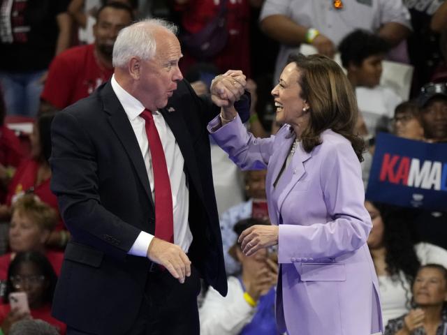 Democratic presidential nominee Vice President Kamala Harris and running mate Minnesota Gov. Tim Walz attend a campaign rally at the University of Nevada, Las Vegas on Aug. 10, 2024. (AP Photo/Jae Hong)