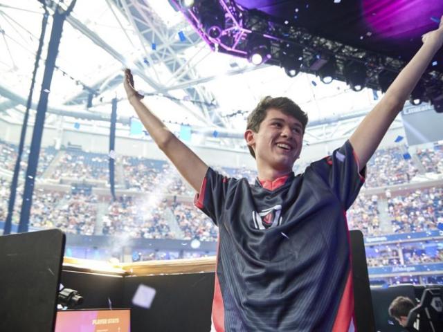 In this Sunday, July 28, 2019 photo provided by Epic games, Kyle Giersdorf reacts after he won the Fortnite World Cup solo finals in New York. (Epic Games via AP) 