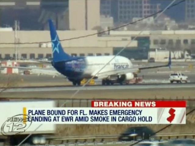 In this image taken from video provided by News12 New Jersey, Air Transat Flight 942 is towed along the runway at Newark Liberty International Airport, Saturday, March 9, 2019 in Newark, NJ. (News12 New Jersey via AP)