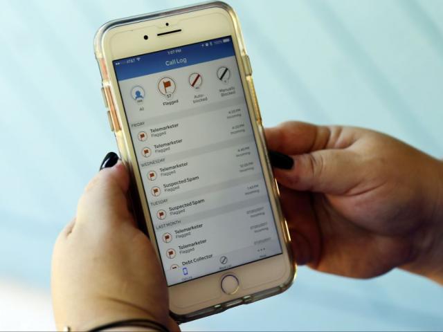 This Aug. 1, 2017, file photo, shows a call log displayed via an AT&amp;T app on a cellphone in Orlando, Fla. New tools are coming to help fight robocall scams, but don’t expect unwanted calls to disappear. (AP Photo/John Raoux, File)
