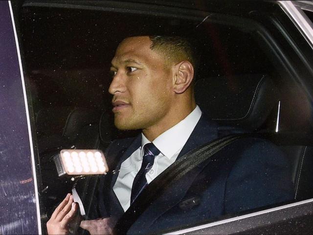 Australian rugby union player Israel Folau leaves a Code of Conduct hearing in Sydney. (AAP Image/Bianca De Marchi) 