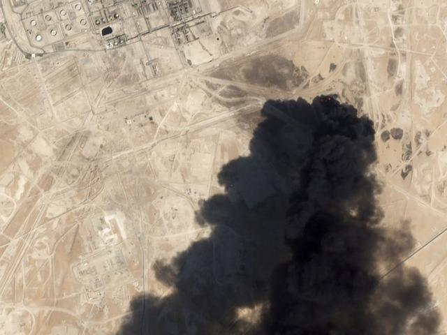 Satellite image from Planet Labs Inc. shows thick black smoke rising from Saudi Aramco&#039;s Abqaiq oil processing facility in Buqyaq, Saudi Arabia (Planet Labs Inc via AP)