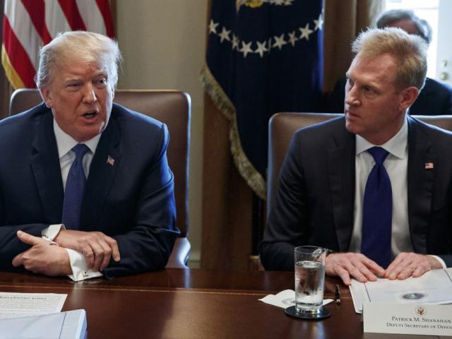 In this April 9, 2018, AP file photo, Deputy Secretary of Defense Patrick Shanahan, right, listen as President Donald Trump speaks during a cabinet meeting at the White House, in Washington.