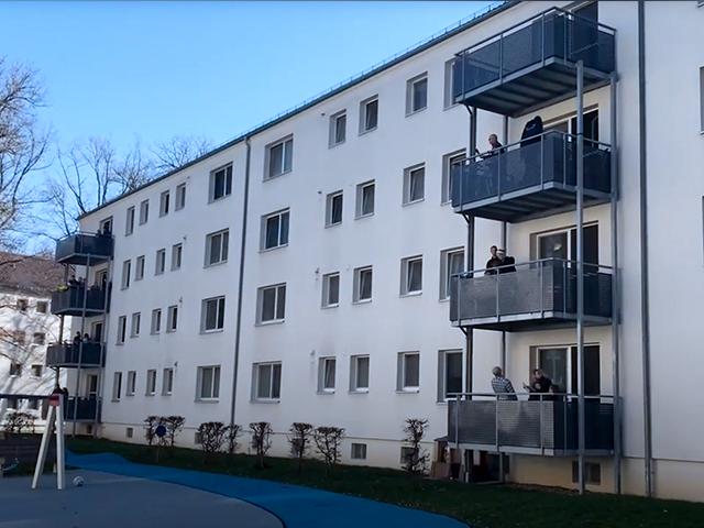 Screen capture of a US military housing in Germany where a worship service was held from a balcony.