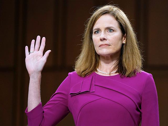 Supreme Court nominee Amy Coney Barrett is sworn in during a confirmation hearing before the Senate Judiciary Committee, Monday, Oct. 12, 2020, in Washington. (AP Photo/Patrick Semansky, Pool)