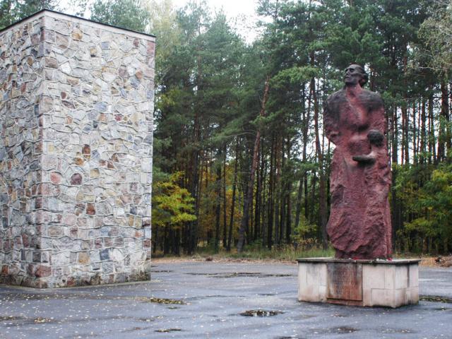 In this photo taken Oct. 11, 2003, a monument commemorating the estimated 250,000 people who were killed at the Nazi death camp of Sobibor is seen on the former camp grounds in Sobibor, eastern Poland. (AP Photo)