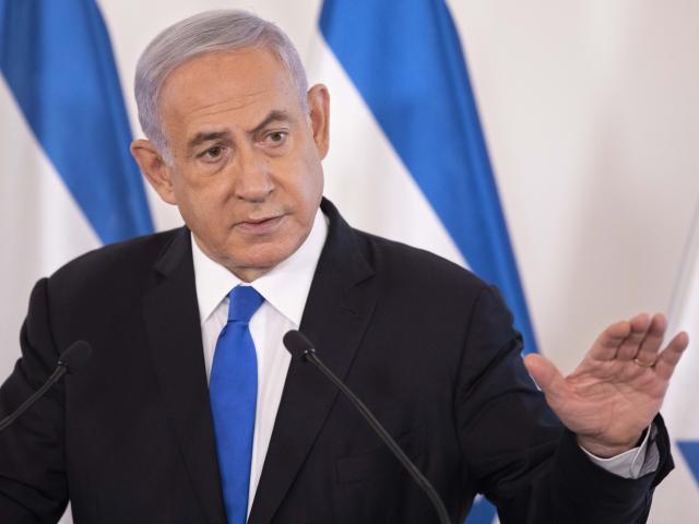 Israeli Prime Minister Benjamin Netanyahu gestures as he speaks during a briefing to ambassadors to Israel at the Hakirya military base in Tel Aviv, Israel, Wednesday, May 19, 2021. (AP Photo/Sebastian Scheiner, Pool)