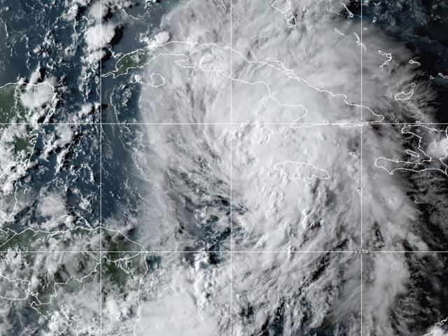 This OES-16 East GeoColor satellite image taken Thursday, Aug. 26, 2021, at 10:20 p.m. EDT, and provided by NOAA, shows Tropical Storm Ida in the Caribbean Sea. (NOAA via AP)