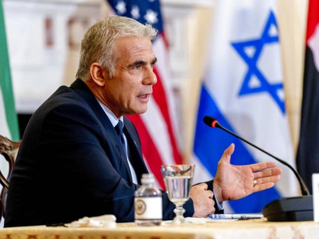 Israeli Foreign Minister Yair Lapid speaks at a news conference with Secretary of State Antony Blinken and United Arab Emirates Foreign Minister Sheikh Abdullah bin Zayed al-Nahyanin. (AP Photo)