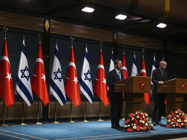 Turkish President Recep Tayyip Erdogan, right, and Israel&#039;s President Isaac Herzog speak to the media after their talks, in Ankara, Turkey, Wednesday, March 9, 2022. (AP Photo)
