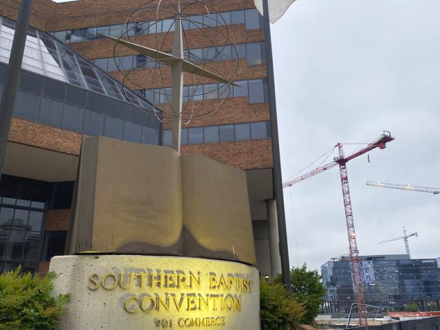 A cross and Bible sculpture stand outside the Southern Baptist Convention headquarters in Nashville, Tenn., on Tuesday, May 24, 2022. (AP Photo)
