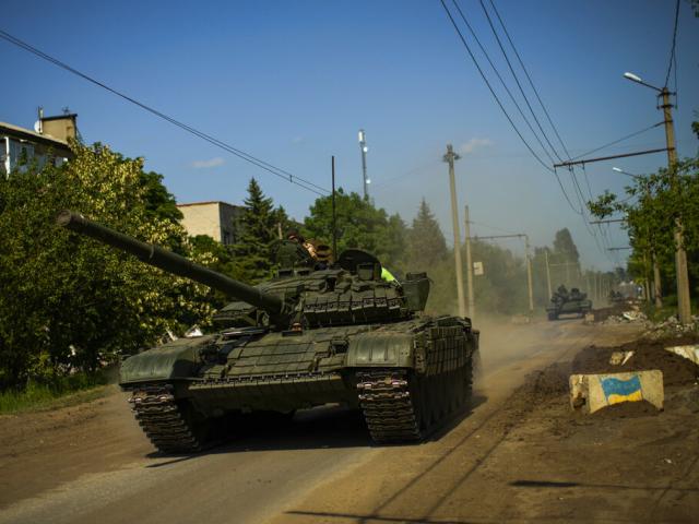 Ukrainian tanks move in Donetsk region, eastern Ukraine, Monday, May 30, 2022. (AP Photo/Francisco Seco, file)