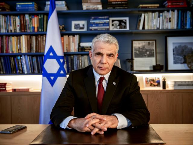 Yair Lapid poses for a photo at his office in Tel Aviv, Israel, Thursday, May 21, 2020. (AP Photo/Oded Balilty, File)
