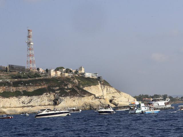 Lebanese protesters in boats demand the cash-strapped country&#039;s right to its oil and gas fields on the Mediterranean Sea, in the southern marine border town of Naqoura, Lebanon, Sunday, Sept. 4, 2022. (AP Photo)