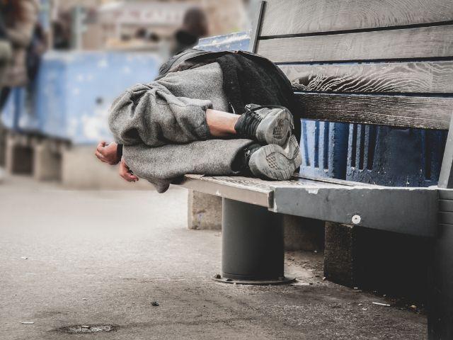 homeless, sleeping on the bench