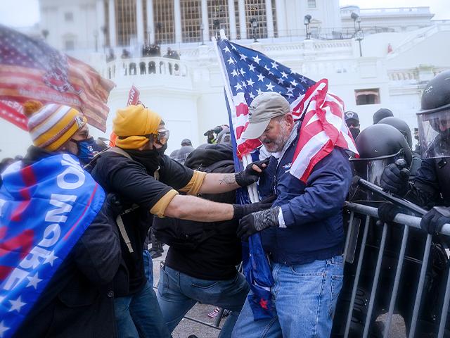 Trump supporters try to break through a police barrier, Wednesday, Jan. 6, 2021, atTrump supporters try to break through a police barrier, Wednesday, Jan. 6, 2021, at the Capitol in Washington. the Capitol in Washington.