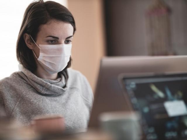 A woman working from her home during the coronavirus outbreak. Photo Credit: Engin Akyurt, Unsplash.