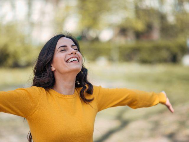 girl with arms extending