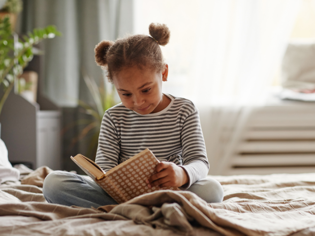 girl sitting and reading