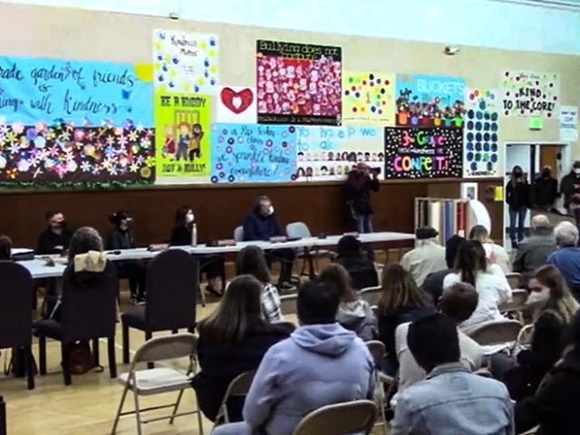 Parents protest at a harrisonburg school board meeting