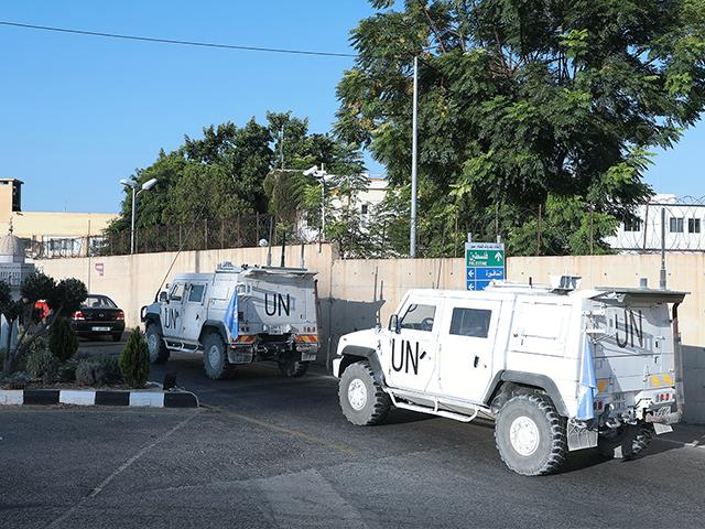 U.N. peacekeeping military vehicles enter the headquarters of the U.N. peacekeeping force in the southern Lebanese border town of Naqoura, Lebanon, Wednesday, Oct. 14, 2020. (AP Photo/Bilal Hussein)