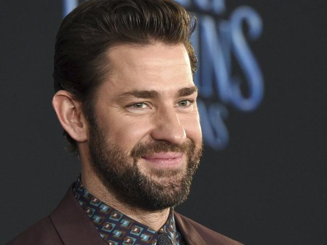 In this Nov. 29, 2018 file photo, John Krasinski poses at the premiere of the film &quot;Mary Poppins Returns.&quot; (Photo by Chris Pizzello/Invision/AP, File)