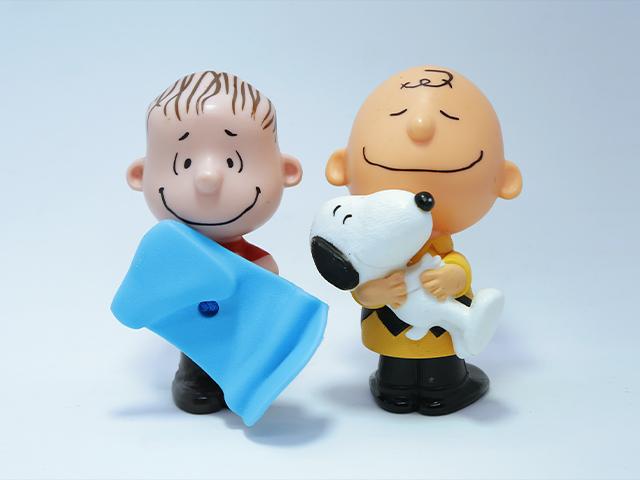 Linus, Charlie Brown, and Snoopy (Adobe stock photo) 